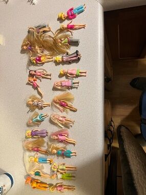 Lot of Polly pocket dolls